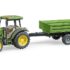 John Deere 5115 M with tipping trailer