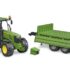 John Deere 5115 M with tipping trailer